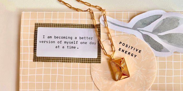 A Love Letters Envelope Locket shown with a quote that reads